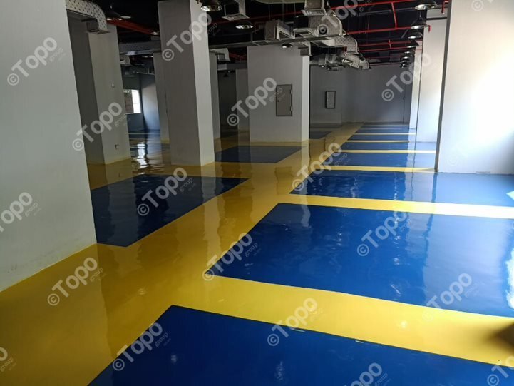 Epoxy parkiran basement oleh CV Topo Group dengan tekstur anti slip.